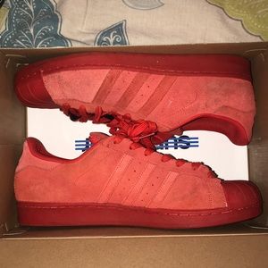 All red adidas superstar RT